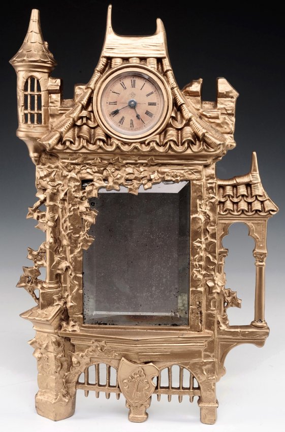 ANSONIA ‘CASTLE’ EASEL BACK IRON MIRROR CLOCK