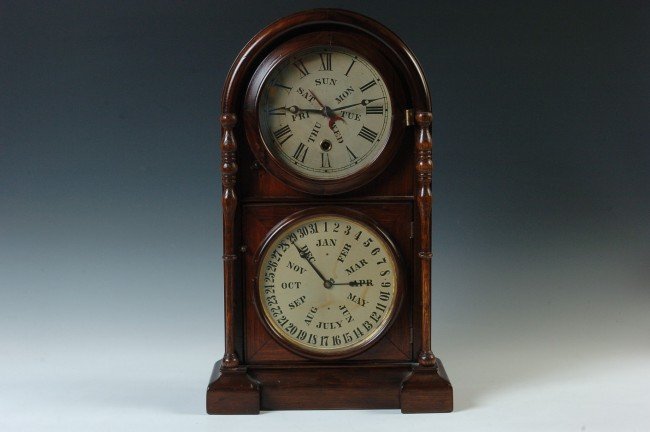 A WELCH ITALIAN NO. 1 DOUBLE DIAL CALENDAR CLOCK