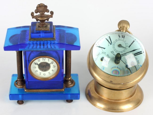 A reproduction brass bull’s eye desk clock