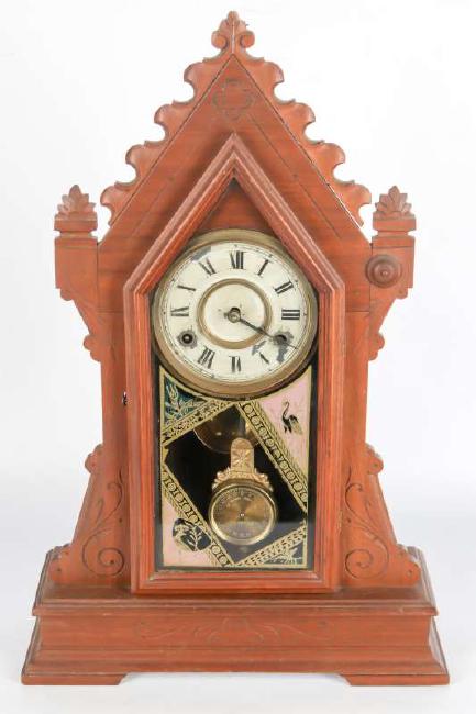 A NEW HAVEN ‘CLYDE’ FANCY WALNUT PARLOR CLOCK