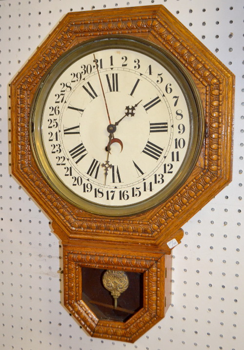 Antique Pressed Oak Octagon Drop Calendar Clock