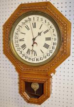 Antique Pressed Oak Octagon Drop Calendar Clock