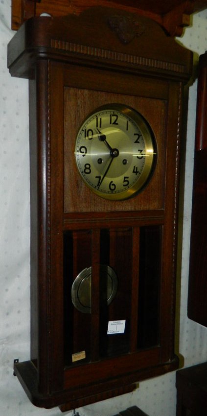 German walnut 8 day pendulum wall clock.
