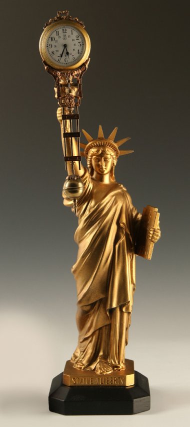 A RARE JUNGHANS STATUE OF LIBERTY SWINGER CLOCK