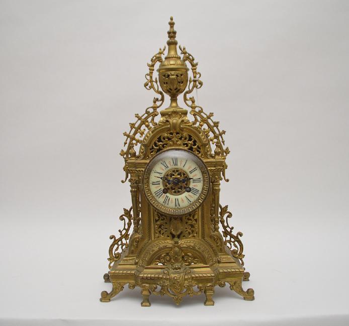 Antique Brass Clock with time and strike movement.  The