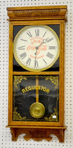 Ingraham “Coca Cola” Oak Store Regulator