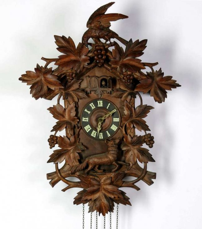 AN ANTIQUE BLACK FOREST TWO BIRD CUCKOO CLOCK