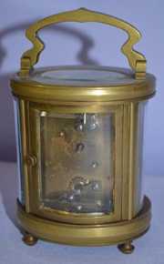 French Oval Glass & Brass Carriage Clock