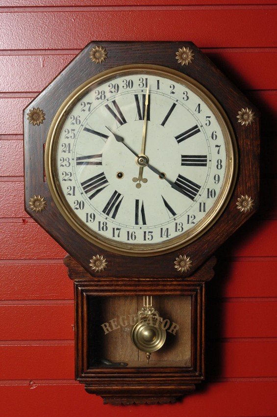 A WATERBURY ‘EDNA’ SHORT DROP CALENDAR CLOCK