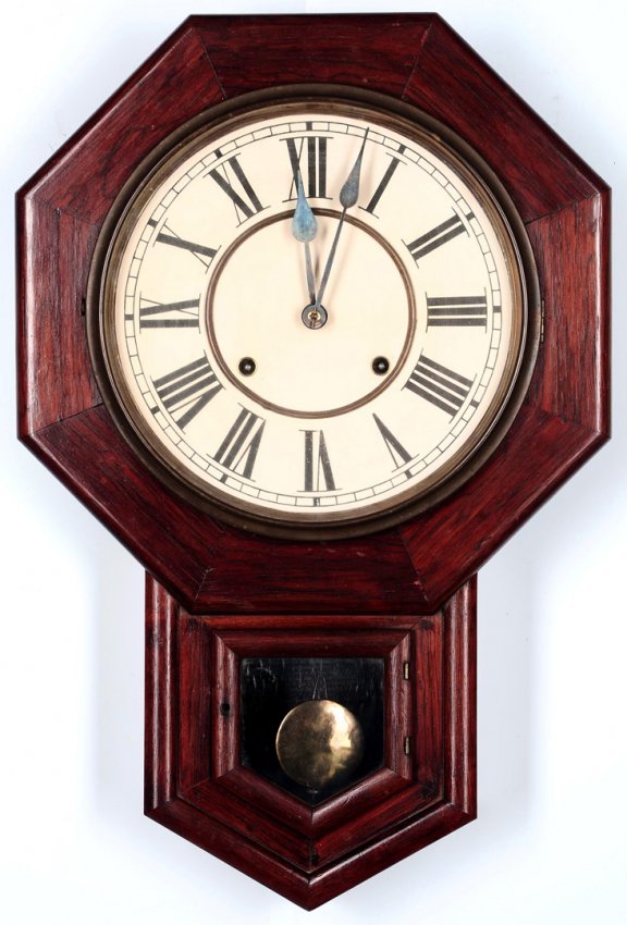 A WATERBURY OCTAGON DROP MAHOGANY WALL CLOCK