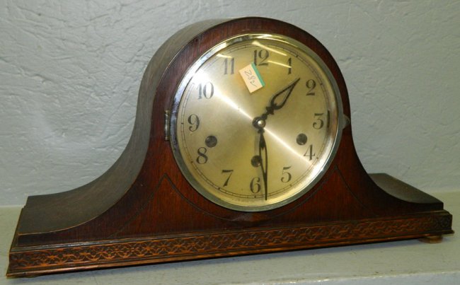 8 day German oak chiming clock.  17″ x 9″