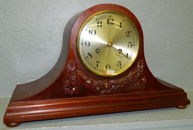 Crvd. walnut head & shoulders style 8 day clock.