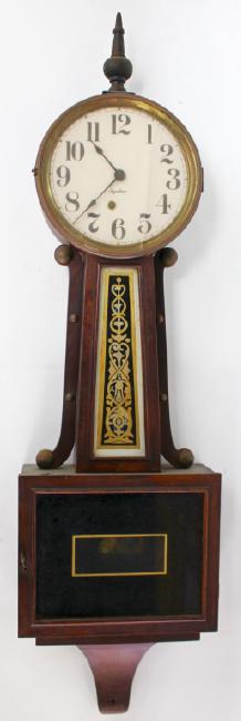 Early 20th century Walnut cased presentation banjo clock by Elias Ingraham Clock Co