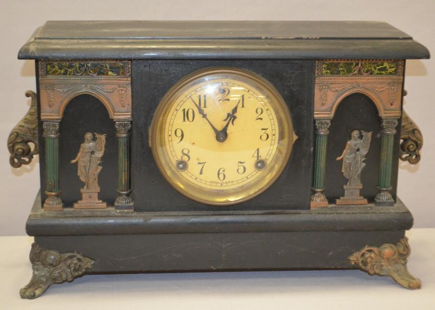 Antique Mantel Clock with Ornate Decor