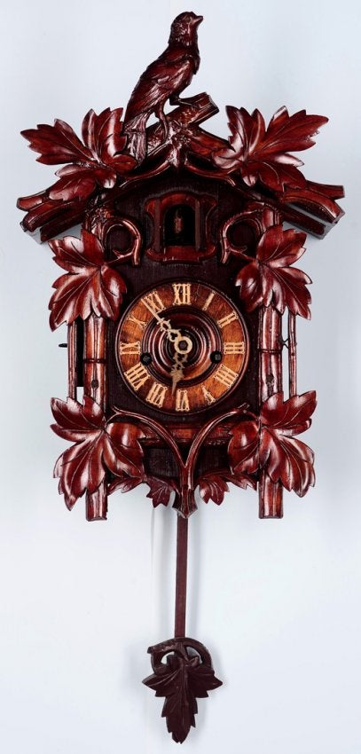 A BLACK FOREST CUCKOO AND QUAIL CLOCK SIGNED BEHA