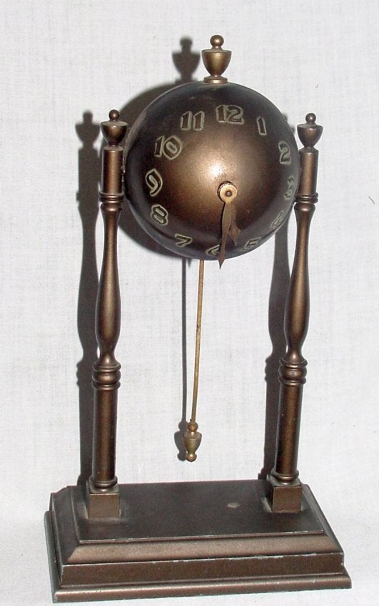 GCC Novelty Clock w/Globe