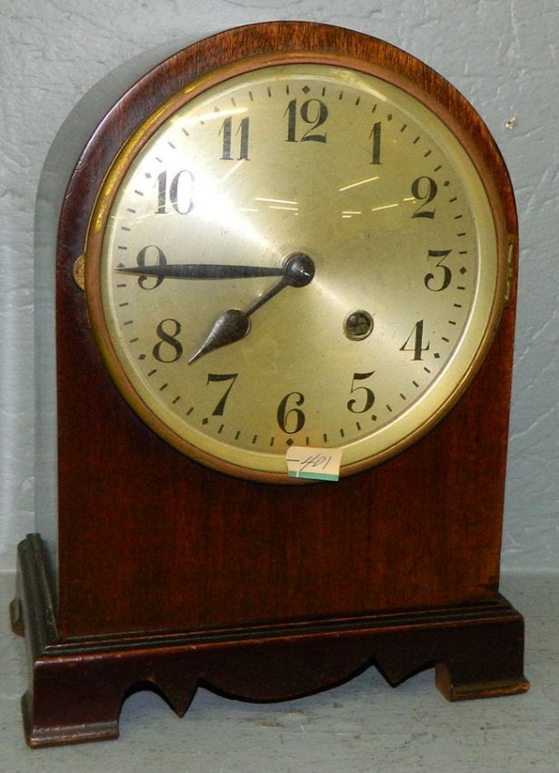 Mahogany large face 8 day Gothic style clock.