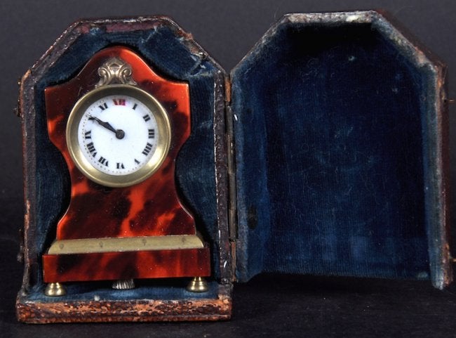 A SMALL FRENCH TORTOISESHELL CLOCK, 2.5 inches high, in