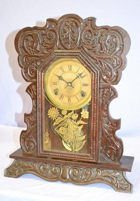 Waterbury Walnut “Uncas” Kitchen Clock. T&S, signed