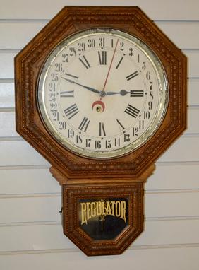 Antique Ingraham Octogon Calendar Drop Clock. Oak case,
