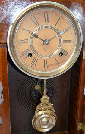 Antique Ansonia “Beaver” Kitchen Clock. Walnut case is