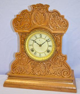 Waterbury Oak “Zambo” Shelf Clock. T&S, signed paper