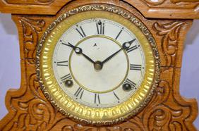 Waterbury Oak “Zambo” Shelf Clock. T&S, signed paper
