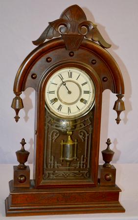 Antique Walnut Kitchen Mantel Clock. T & S; 5 1/2″ dial;