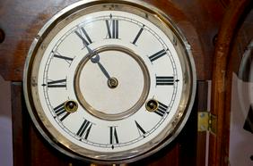 Antique Walnut Kitchen Mantel Clock. T & S; 5 1/2″ dial;