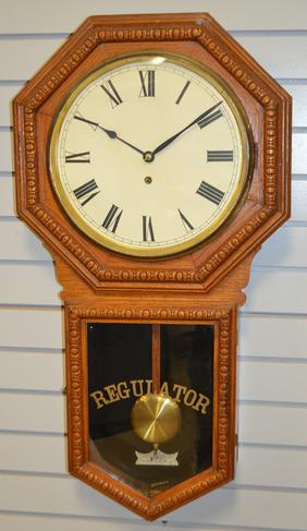 Waterbury Oak “Heron”  Regulator. T/O, unsigned 12″