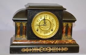 Ermine Mantel Clock. Brown marbleized moldings and