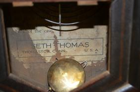 Seth Thomas Short Drop Octogon Clock. T&S, signed 10″