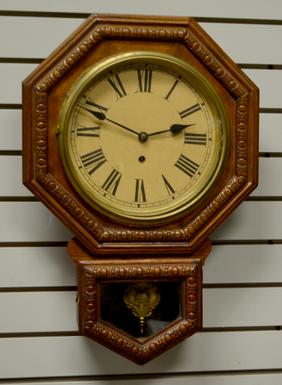 Oak Octogon Short Drape Clock. T/O, unsigned 10″ paper