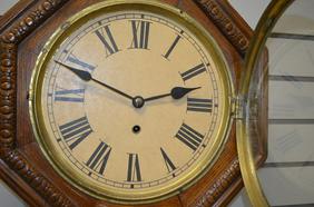 Oak Octogon Short Drape Clock. T/O, unsigned 10″ paper