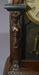 Antique Junghans figure wood mantle clock