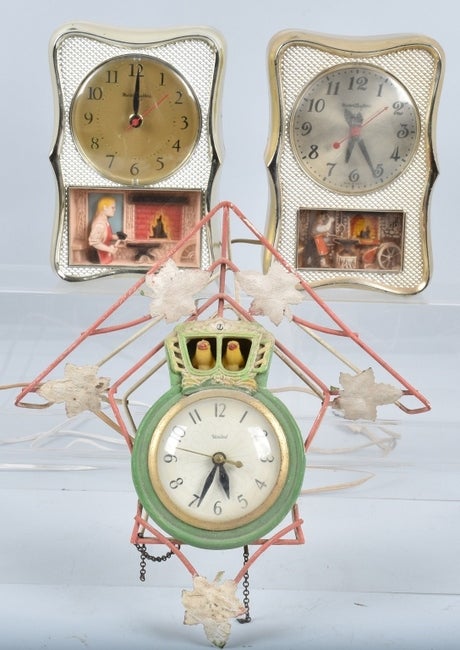Lot of 2 Electric Animated Mantle Clock Price Guide