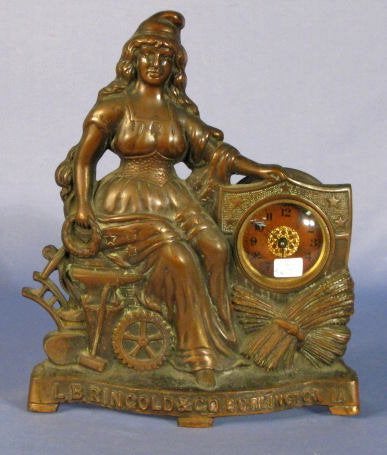 Iron Front Figural Clock w/Iowa Advertising