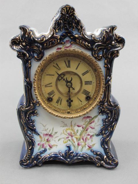 ATTRIBUTED F. KROEBER CHINA CASED MANTLE CLOCK