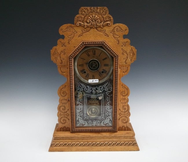 AN ANSONIA KITCHEN CLOCK WITH ALARM