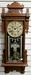 Gilbert "Thespian" Carved Walnut Wall Clock