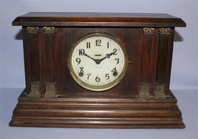 Ingraham Wood Grain 4 Column Mantle Clock