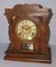 Carved Oak Visible Pendulum Cabinet Clock