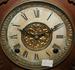 Carved Oak Visible Pendulum Cabinet Clock