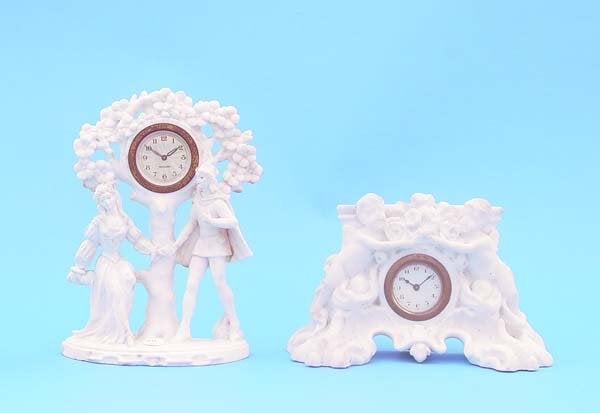 Two German Marble Type Figural Clocks