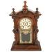 A Carved Rosewood Welch 'Patti VP' Shelf Clock