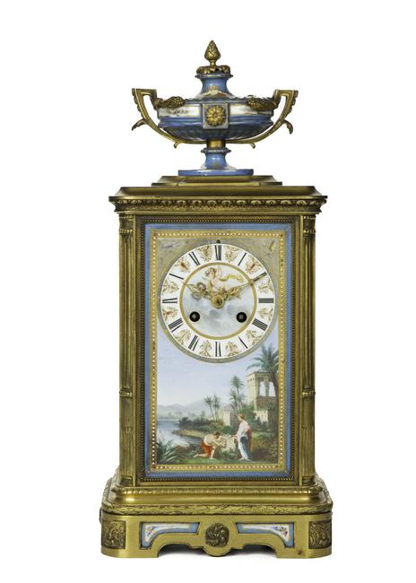 A French gilt-bronze and porcelain mantel clock