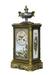 A French gilt-bronze and porcelain mantel clock