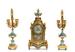 A gilt-bronze and porcelain mantel clock and garniture