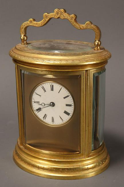 French Gilt Brass Oval Carriage Clock,