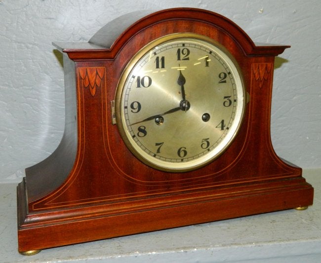 English mahogany inlaid case eight day clock. .